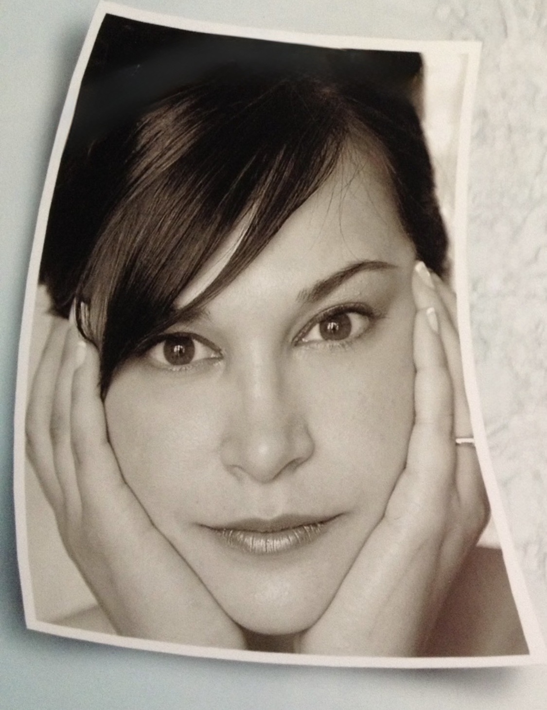 A printed black-and-white portrait photograph of Dr. Brandy.