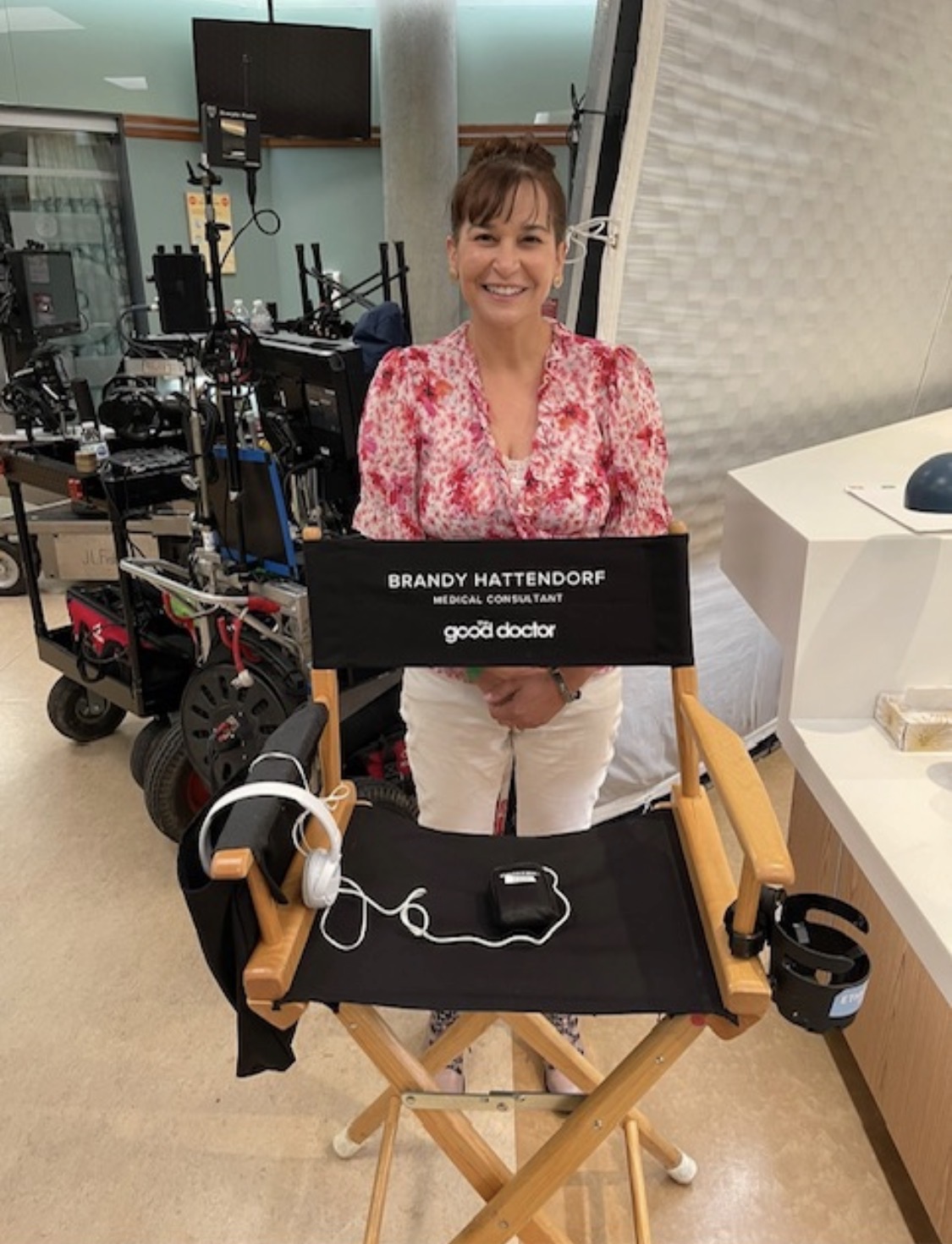 Dr. Brandy behind her medical consultant chair on The Good Doctor set.